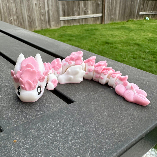 Sakura blossom inspired 3d printed articulated dragon